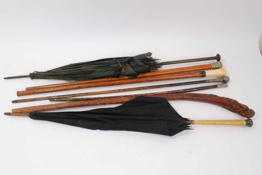 Lot 753 - Collection of walking sticks and parasols