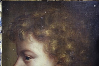 Lot 454 - 18th century, Italian School, oil on canvas - portrait of a young boy in profile, in ornate parcel gilt carved Florentine frame