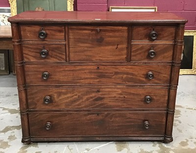 Lot 1331 - George IV mahogany chest with central secretaire drawer flanked by four short drawers and three long drawers below