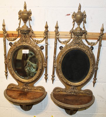 Lot 1334 - Pair of Victorian gilt framed mirrored wall shelves