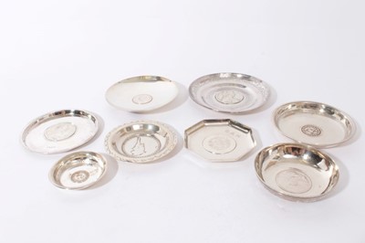 Lot 280 - Group of eight Continental silver and white metal pin dishes, each one set with a coin or medallion, all at approximately 13.5oz