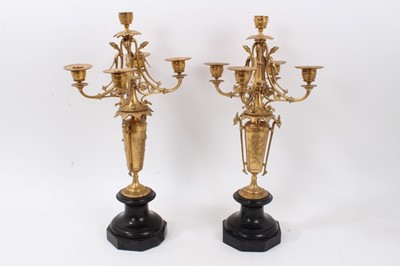 Lot 758 - Pair of Victorian gilt metal five  branch candelabra