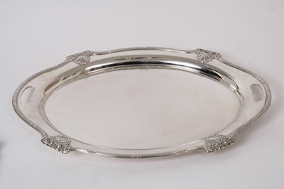 Lot 319 - Impressive George V silver tray of oval form with reeded and shell borders and twin cut out handles (Sheffield 1935), Maker Walker & Hall. all at approximately 79oz, 56.5cm in length