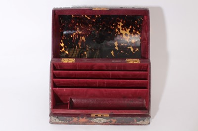 Lot 321 - Victorian leather stationary box with Tortoiseshell and silver mounts, sloped hinged cover opening to reveal fitted interior, together with a similar desk blotter, (London 1892), Maker, William Com...