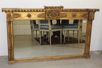 Lot 1357 - George IV giltwood overmantel mirror, with stepped cornice and anthemion and flower head tablet frieze, rectangular plate between projecting cluster columns, 138 x 79cm