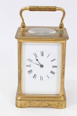 Lot 648 - Brass carriage clock with enamel dial and striking movement in traditional case with key ,17 cm high