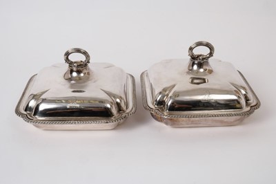 Lot 363 - Pair 19th century plated entree dishes with covers of square form with eagle crests , gadrooned borders and reeded loop handles, 21cm wide