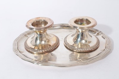 Lot 373 - Pair German 925 silver candlesticks of squat circular form 7.5 cm and 835 silver oval platter 29.5 cm (3)