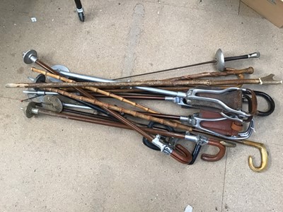 Lot 844 - Collection of assorted sticks to include six shooting stick seats, Eastern white metal stick, horn handled sticks and others (16 items)