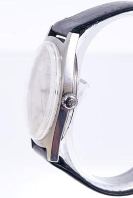 Lot 596 - Gentlemen's Omega Genève Automatic wristwatch, the circular satin dial with applied steel Arabic and baton hour markers, centre seconds in stainless steel tonneau shape case on black leather strap...