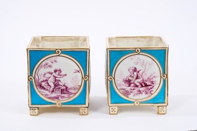 Lot 152 - Good pair of 18th/19th century porcelain cache pots, possibly Sèvres, of square form, decorated in puce with Boucher-style panels of cherubs, on a bleu celeste ground with gilt highlights, standin...