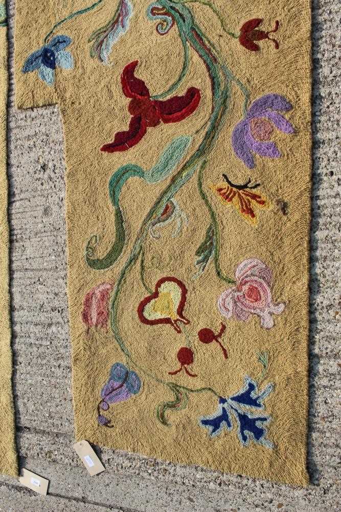 Lot 1390 - Two yellow ground embroidered rugs