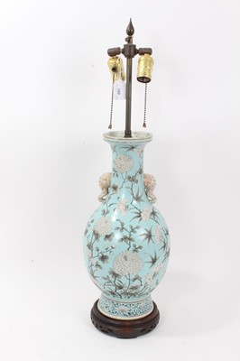 Lot 160 - Chinese porcelain baluster vase, late Qing period, decorated in the Dayazhai style with flowers painted en grisaille, on a turquoise ground, with elephant-head handles, converted to a lamp on a car...