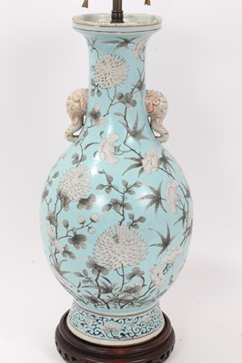 Lot 181 - Chinese porcelain baluster vase, late Qing period, decorated in the Dayazhai style with flowers painted en grisaille, on a turquoise ground, with elephant-head handles, converted to a lamp on a car...