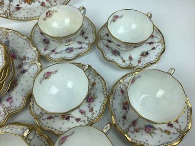 Lot 57 - Good quality Royal Crown Derby tea set with gilt rim and floral decoration