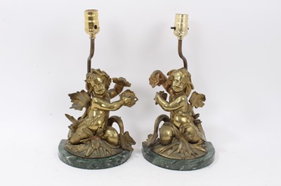 Lot 1273 - Pair of gilt metal figutal table lamps