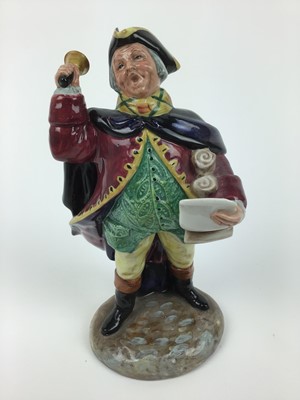 Lot 10 - Four Royal Doulton figures - Silks and Ribbons HN2017, Christmas Parcels HN2851, Prized Possessions HN2942 and Town Crier HN2119