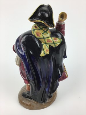 Lot 10 - Four Royal Doulton figures - Silks and Ribbons HN2017, Christmas Parcels HN2851, Prized Possessions HN2942 and Town Crier HN2119