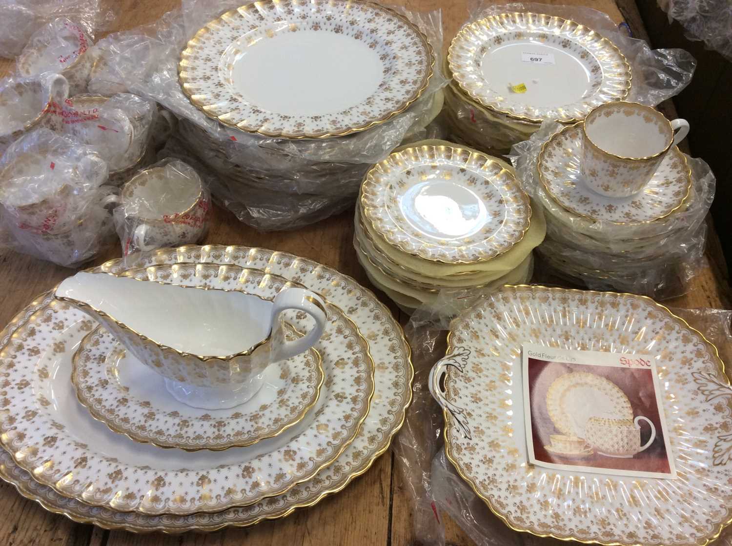 Lot 697 - Spode Gold Fleur de Lys pattern dinner and tea service comprising