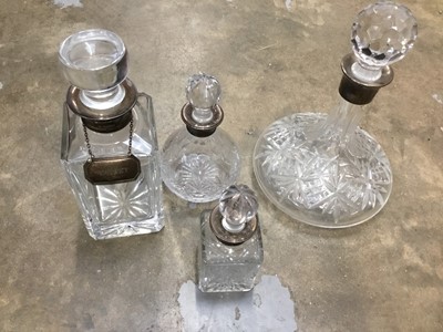 Lot 151 - Four silver mounted decanters