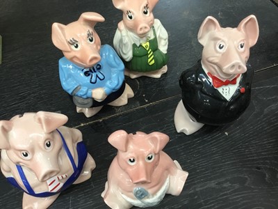 Lot 149 - Set of five Wade Natwest pig money boxes