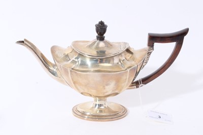 Lot 3 - Late Victorian silver three piece bachelor's tea set of navette form, the teapot with ebony finial and angular handle, raised on oval pedestal foot