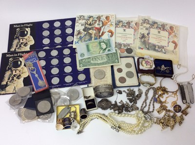 Lot 116 - Victorian silver hinged bangle, silver charm bracelet and costume jewellery, miscellaneous coins and banknotes