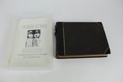 Lot 1054 - WW1 British nurse's photograph album belonging to Nurse Gladys Hughes while at St Dunstan's and VAD St Mark's Enfield. Pages annotated with names, dates and places.