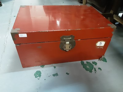 Lot 1036 - Two red lacquer trunks