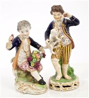 Lot 216 - Two early 19th century Derby figures of boy...