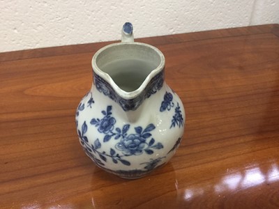Lot 80 - Late 18th / early 19th Century Chinese Export porcelain milk jug with blue and white floral decoration