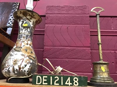 Lot 527 - Victorian decoupage lamp, brass doorstop and a print block