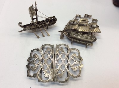 Lot 684 - Edwardian silver nurse's buckle (Birmingham 1908) and two Continental silver/white metal miniature neffs/boats