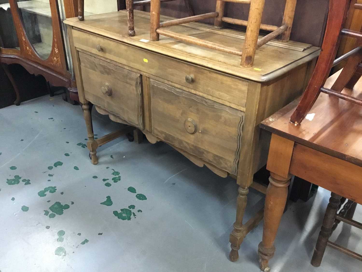 Lot 883 - Sideboard with one long and two short draws