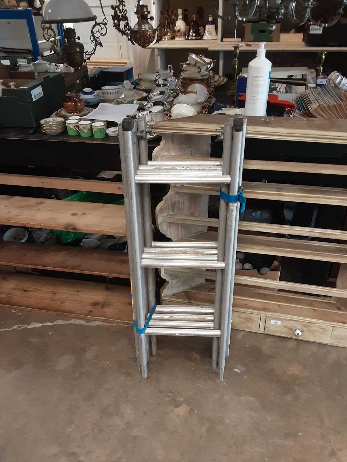 Lot 595 - Five section aluminium ladder