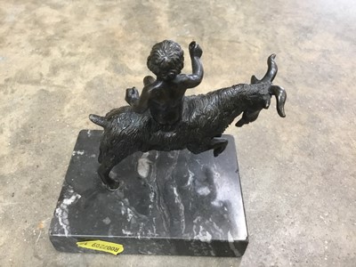 Lot 134 - Bronze figure of a cherub riding a goat