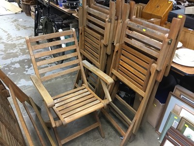 Lot 1015 - Teak folding garden table and six chairs