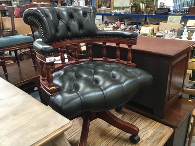 Lot 921 - Green leather revolving desk chair