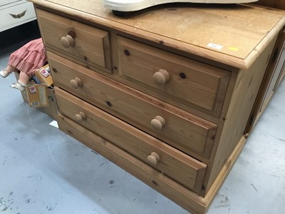 Lot 926 - Pine chest of two short and two long drawers, together with a pine dressing table, pair of pine bedside tables and two pine toilet mirrors