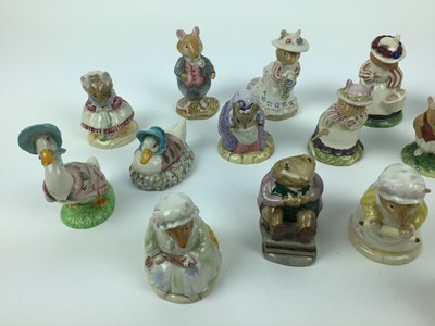 Lot 171 - Three Beswick Beatrix Potter figures, five Royal Albert Beatrix Potter figures and nine Royal Doulton Brambly Hedge figures