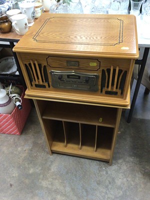 Lot 485 - Classic Collector's Edition record player in light oak case and matching record cabinet