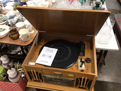 Lot 485 - Classic Collector's Edition record player in light oak case and matching record cabinet