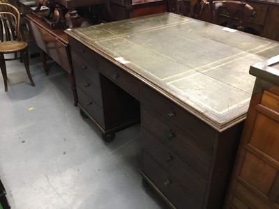 Lot 887 - 19th century oak partners desk with leather lined top and 18 drawers with brass knob handles raised on bun feet 156 cm wide, 104cm deep, 83 cm high