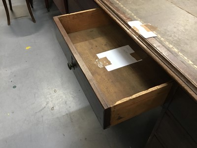 Lot 887 - 19th century oak partners desk with leather lined top and 18 drawers with brass knob handles raised on bun feet 156 cm wide, 104cm deep, 83 cm high