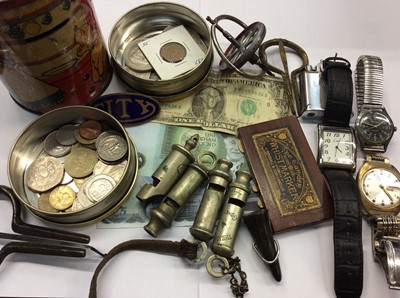 Lot 496 - Old tin containing WWI and police whistles, coins, wristwatches and sundries