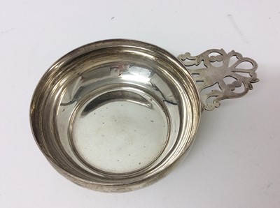Lot 244 - Late Victorian silver wine taster with pierced handle