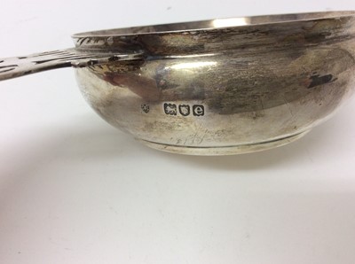 Lot 244 - Late Victorian silver wine taster with pierced handle