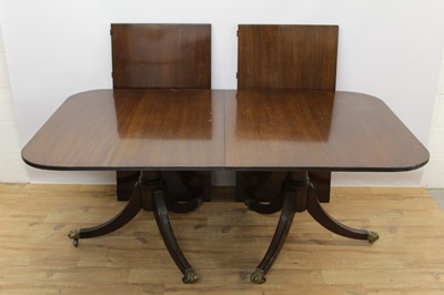 Lot 703 - Victorian mahogany twin pedestal dining table