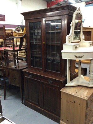 Lot 906 - Edwardian walnut two height bookcase with two leaded glazed doors, drawer and two panelled doors below 105cm wide, 211cm high