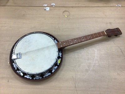 Lot 824 - Acoustic guitar and banjo ukulele